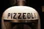 Pizzeoli Wood Fired Pizza logo