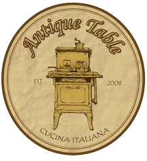 Antique Table Restaurant Logo